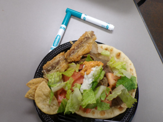 The linear usage of the colorful sticks shows how amaziing the food looks being outlined by an abstract color