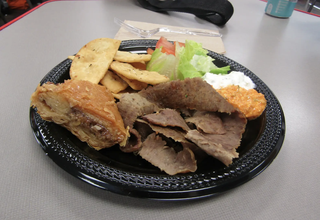 Dino’s serves its gyro platter with classic Mediterranean sides and a sweet finish.