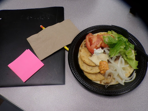 The background features a workspace paired with a mouthwatering lunch. The lunch contains protein, vitamins, fiber, carbs iron and more in it as well.