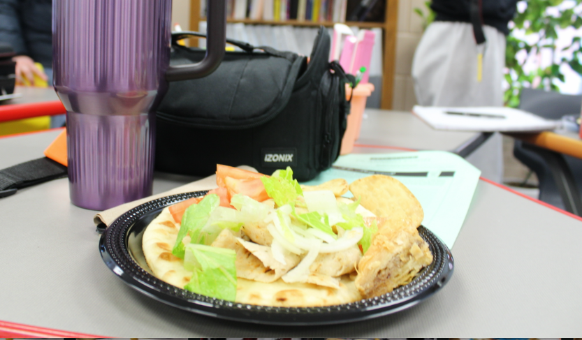 The juicy, well seasoned chicken takes center stage surrounded by all the components creating a mouthwatering focus point. 
