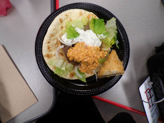 Flavorful plate of Greek food from Dino's Gyros. Sweet and tasty baklava along with a refreshing and delicious gyro. 