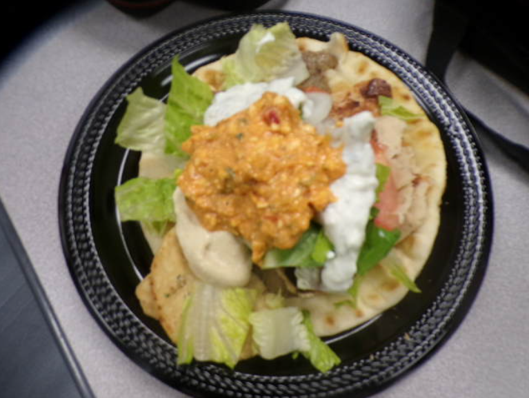 The gyro was overfilled with many different ingredients. It had a hint of garlic, onion, sour and contained a spicy fragrance.