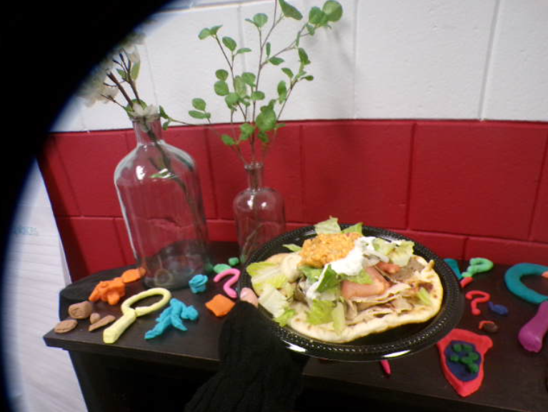 The overview of this dish, shows the chaotic background while the aura of delicious flavors is formidable. It sheds light on the tempting meal.