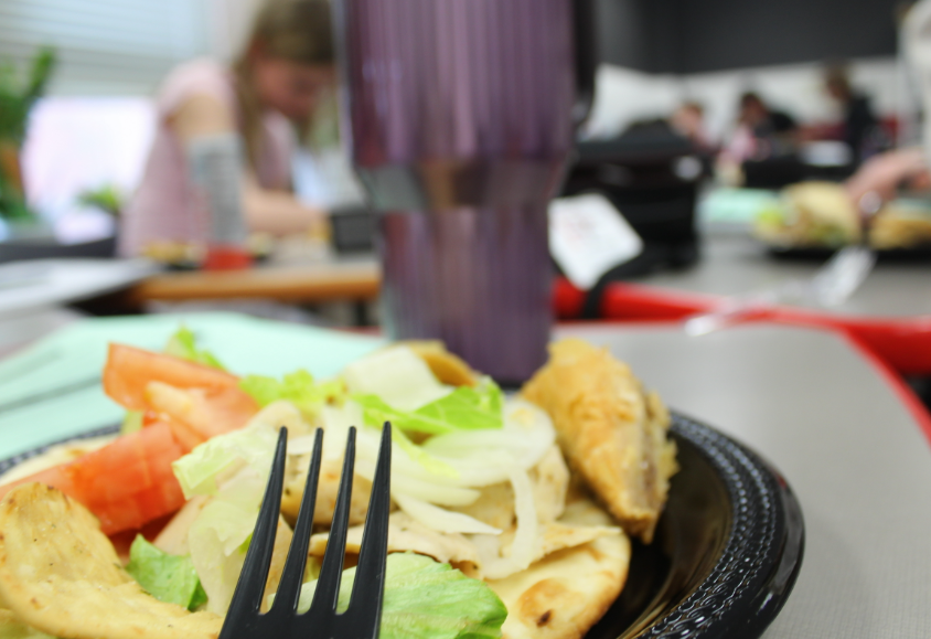 The arrangement of fork draws the eye to the meal highlighting all the components as  an invitation to enjoy the food. 
