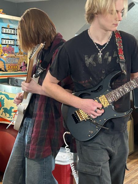 Henry Mankowski and Jack Barton standing back to back establishing connection in and out of the music.